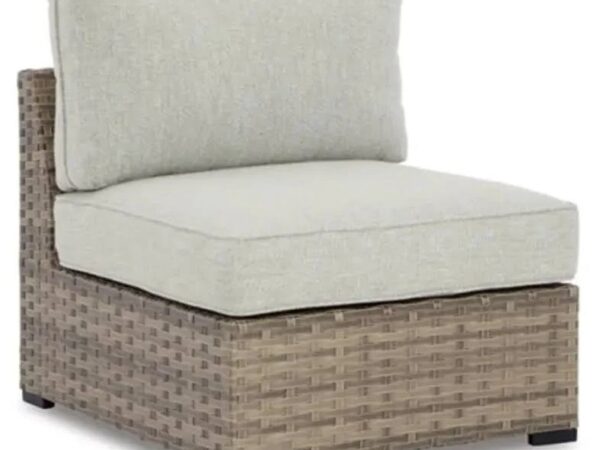 Armless wicker patio chair with light gray cushions.
